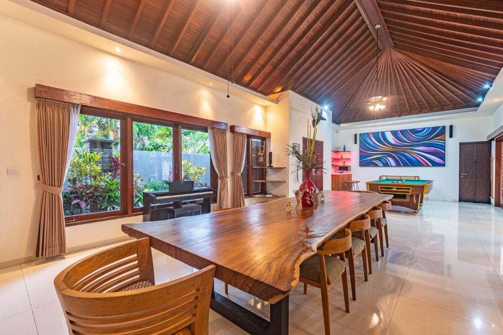 Dining area with wooden ceiling