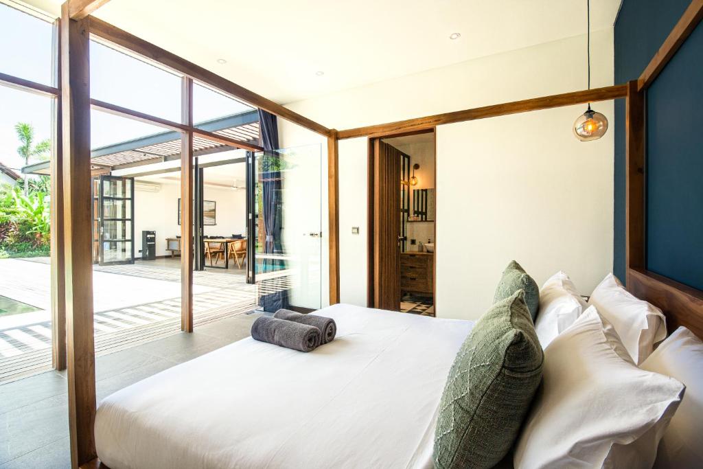 Bedroom with poolside view