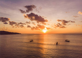 Scenic sunset at Jimbaran Beach