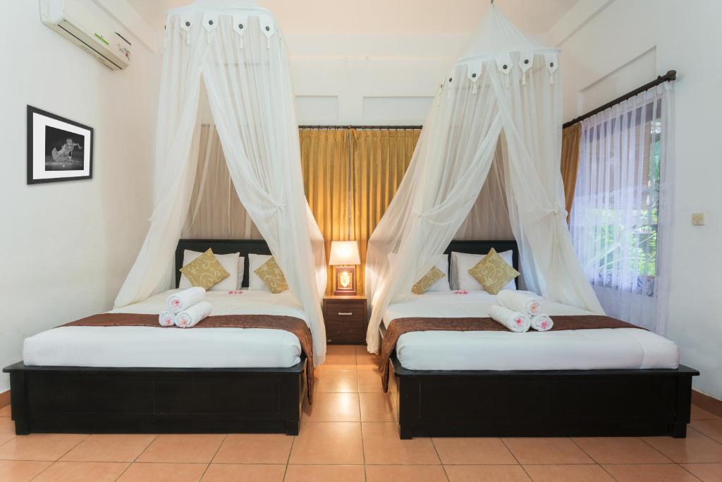 Twin beds at Ani's Villas in Ubud