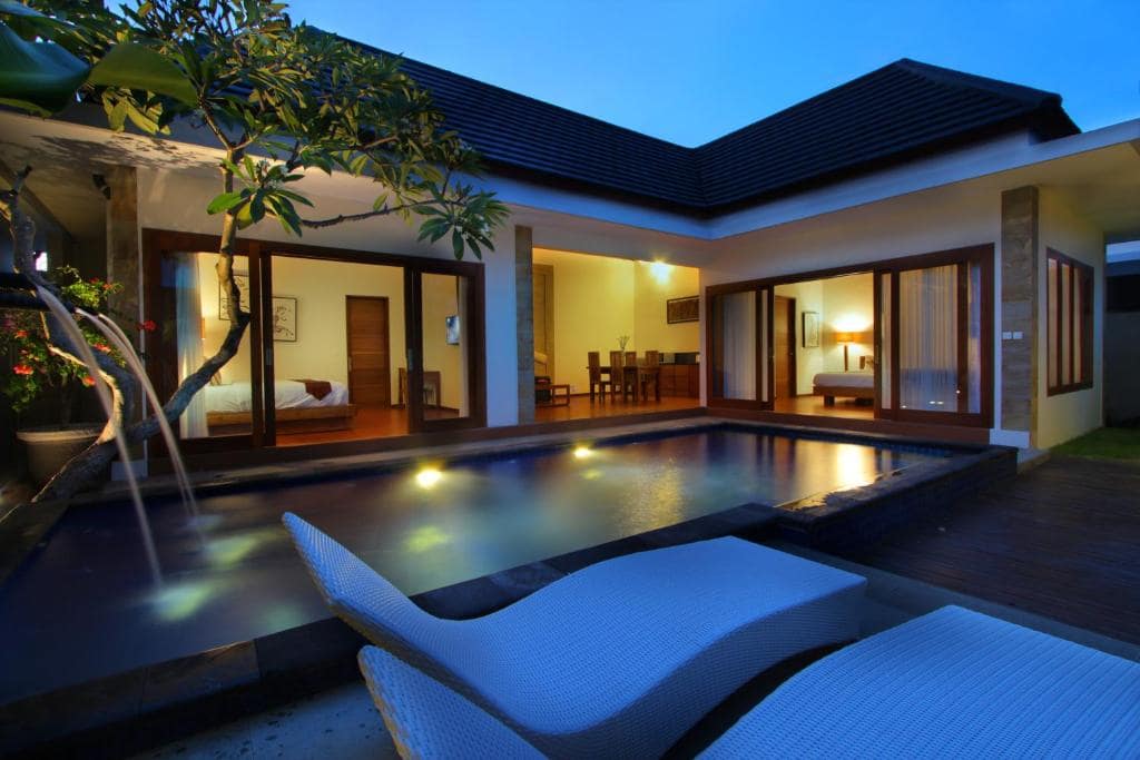 Night time swimming pool at Bali Nyuh Gading Villas