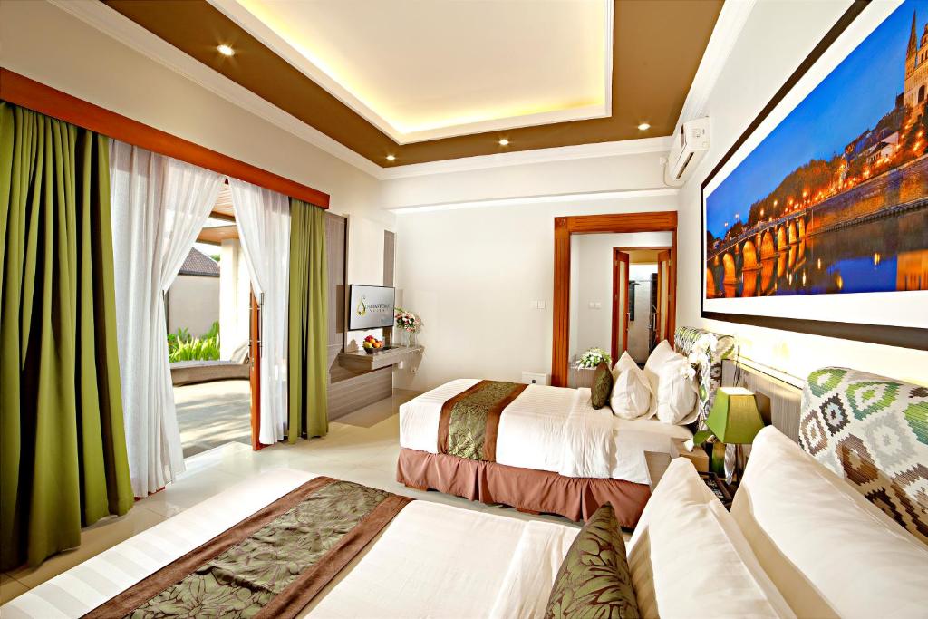 Double bed at The Banyumas Suite Villa Legian