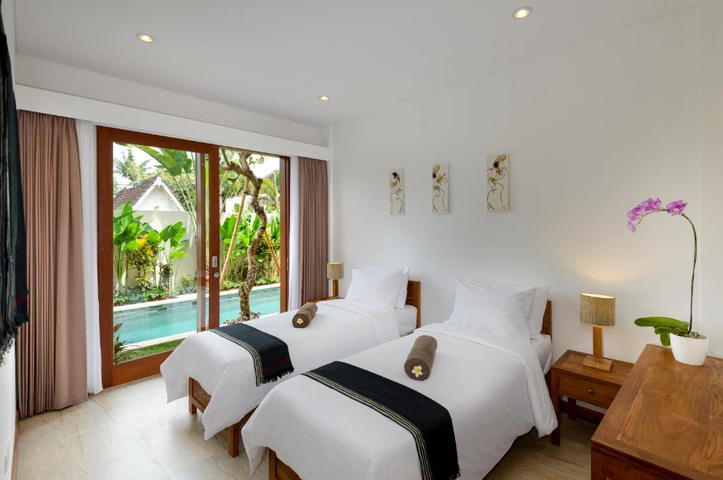Twin bed at Bracha Villas Bali