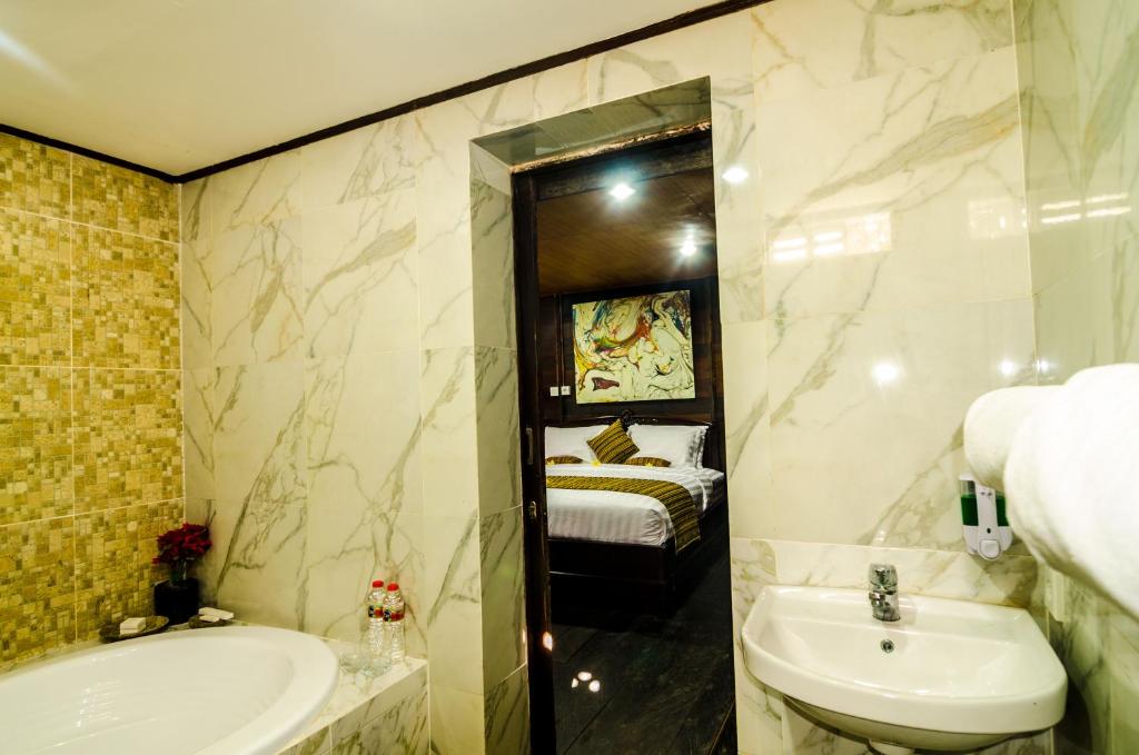 Wash room with shower at The Kawan Jimbaran