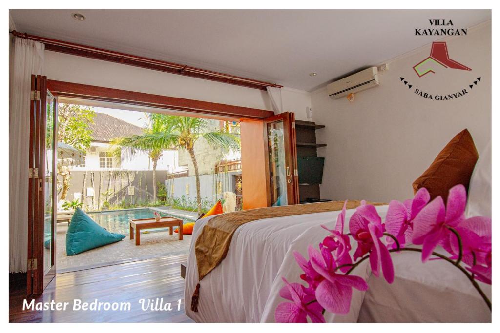 Bedroom with private pool at Kayangan Villas Saba