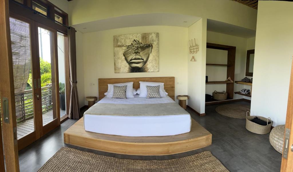 Bedroom with bathroom at La Reserva Villas Bali