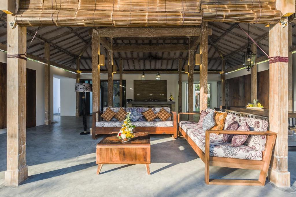 Living hall with sofa at The Melaya Villas