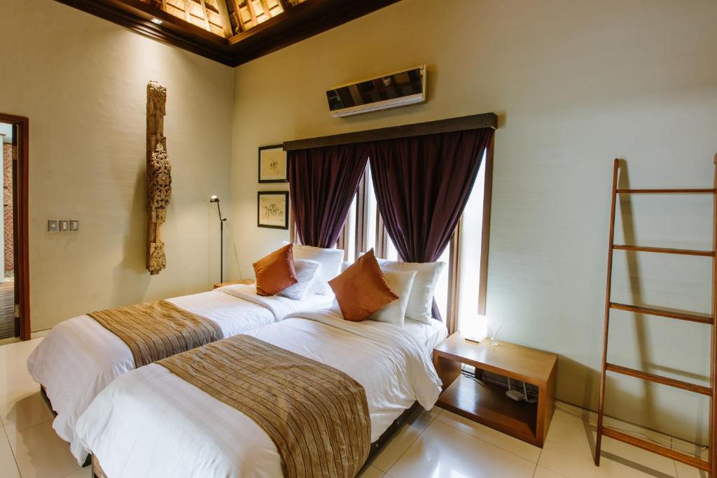 Twin bed at Pronoia Villa Bali