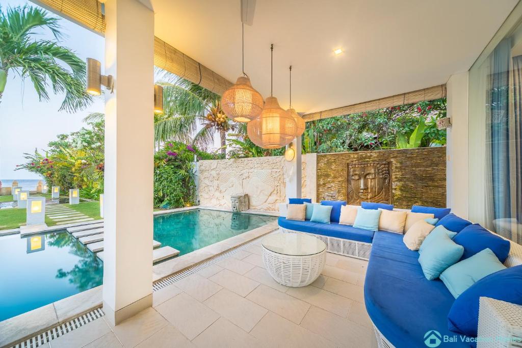 Swimming pool with sofa at Villa Ibiza