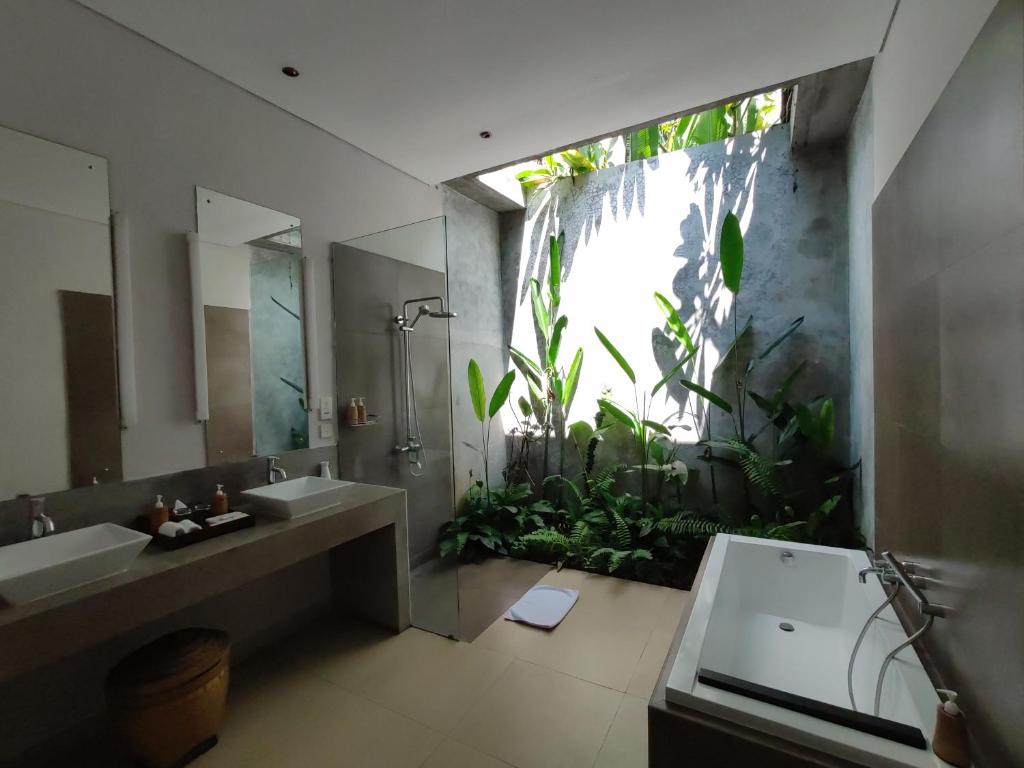 Shower with wash room at Santun Luxury Private Villas