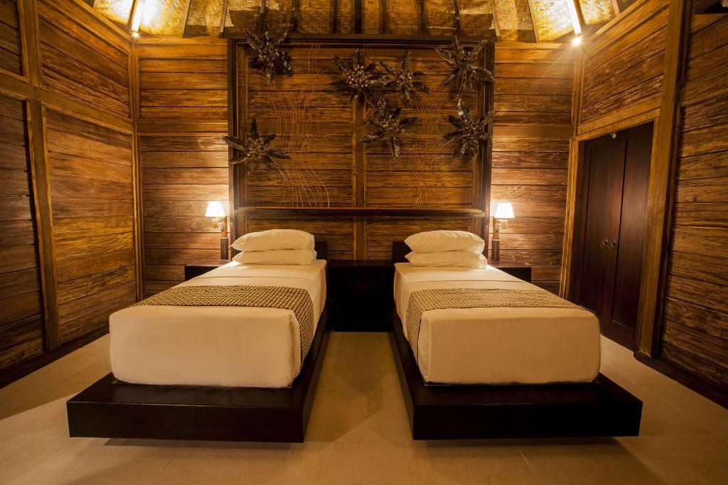 Twin bed at Sri Abi Ratu Villa