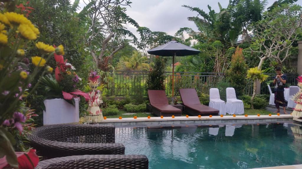 Private pool with char at Ubud Paradise Villa