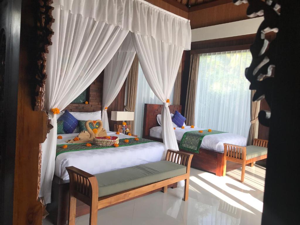 Twin bed at Ubud Paradise Villa