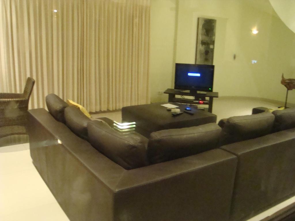 Sofa with Tv at Villa Dunia Impian