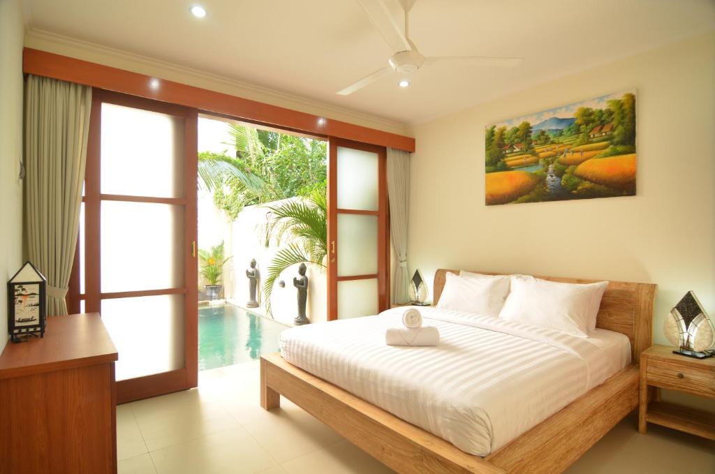Bedroom with AC at Villa Ngetis