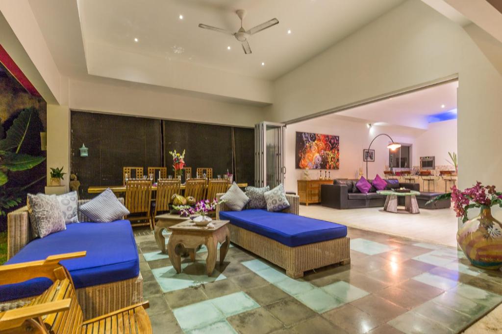 Living hall with dinning table at Villa Purple