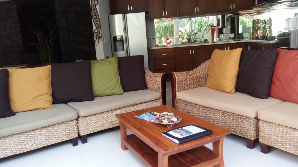 Sofa with table at Villa Rendezvous Bali