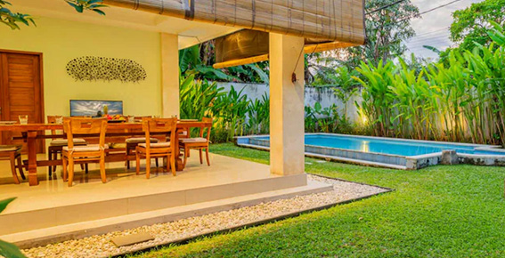 Poolside dining at Bali villa