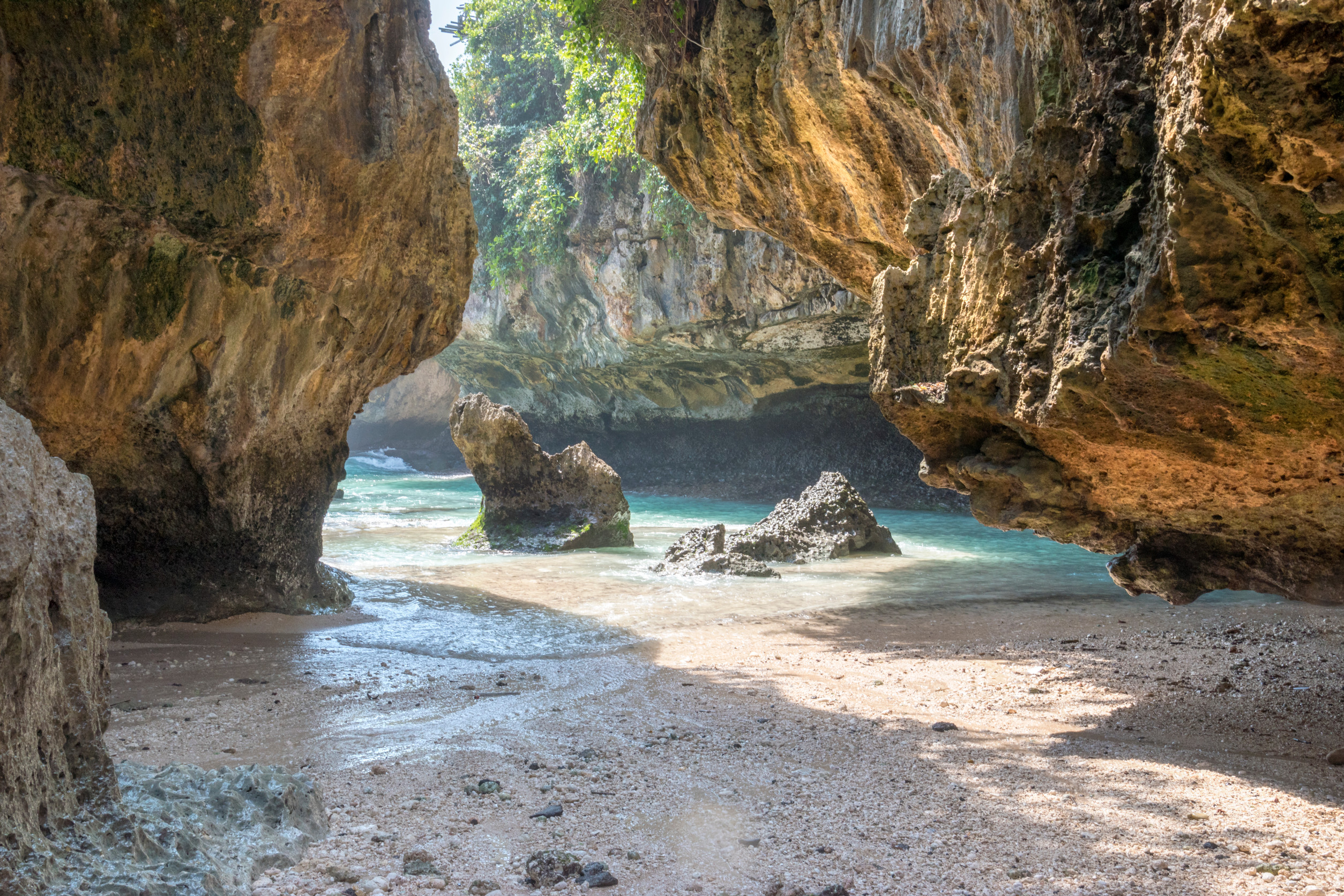 Hidden cove with rocks and turquoise water