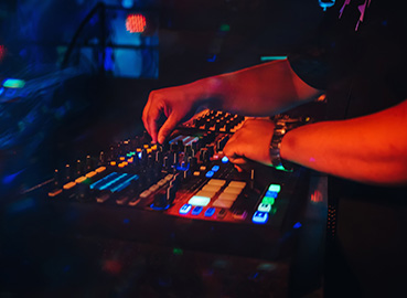 DJ mixing at a vibrant nightlife event