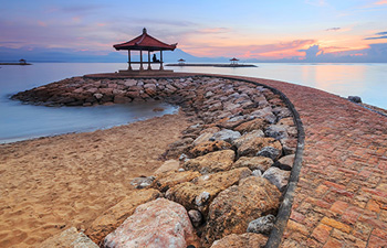 Stone path to gazebo at Sanur beach