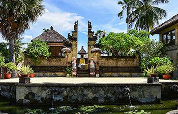 Traditional-style hotel with temple-like garden entrance
