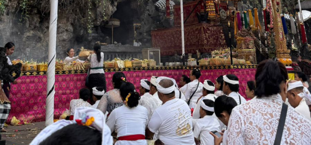 Balinese ceremony with people in traditional attire