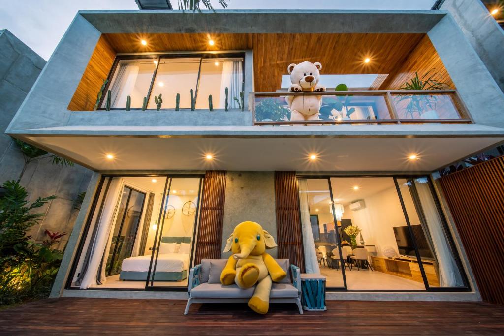 Two-story villa with plush teddy bear decorations