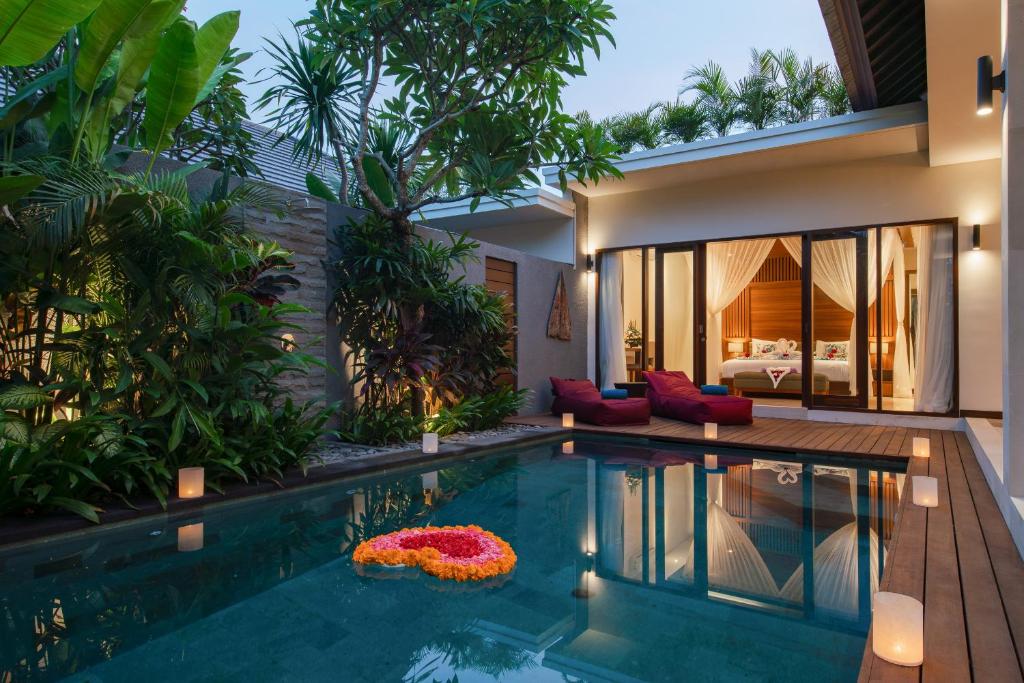 Poolside villa with romantic floral decorations