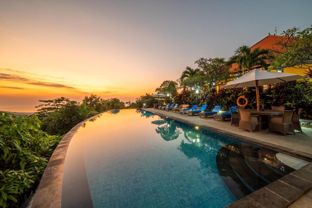 Sunset view over infinity pool