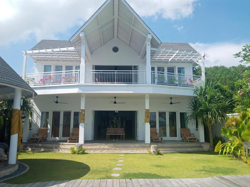 White villa with garden view