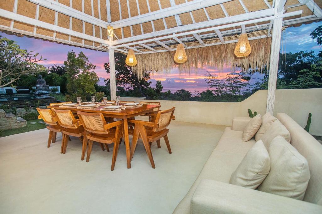puncak villa dining sunset