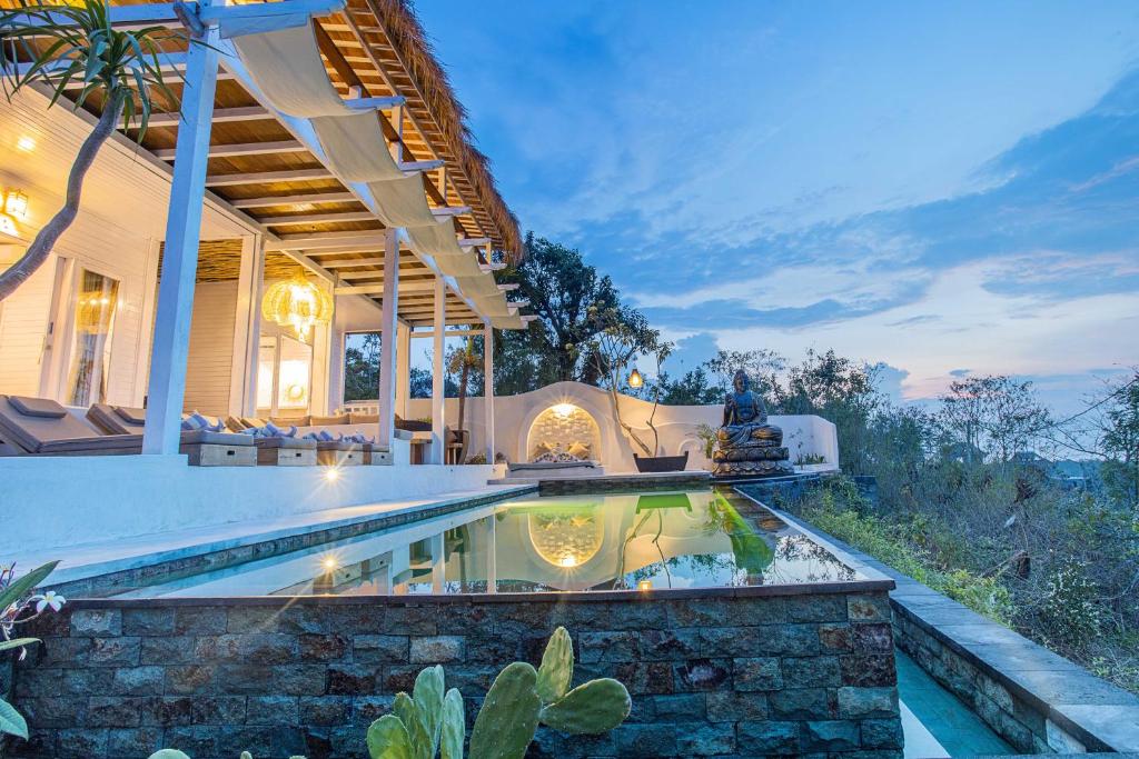 puncak villa poolside sunset