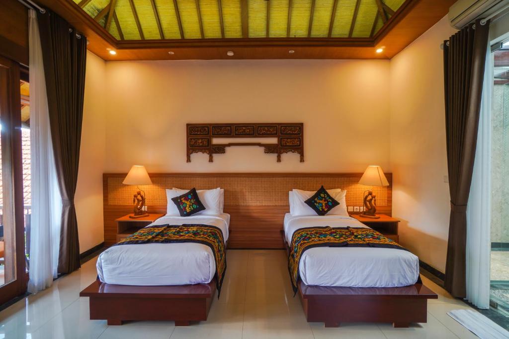 Tropical twin bedroom with natural light