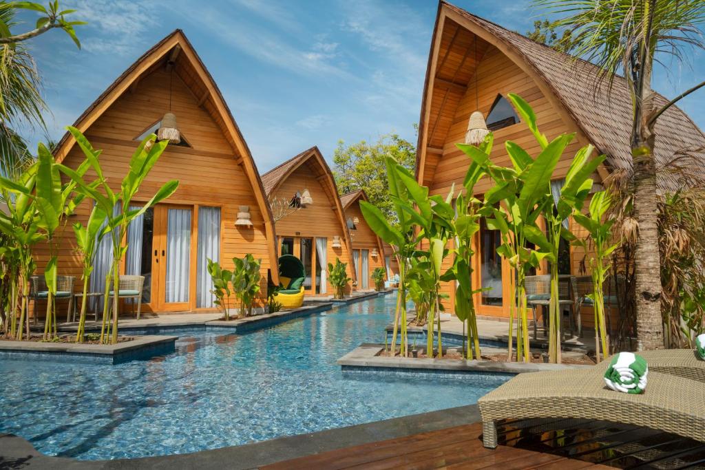 Wooden villas with private pool surrounded by greenery