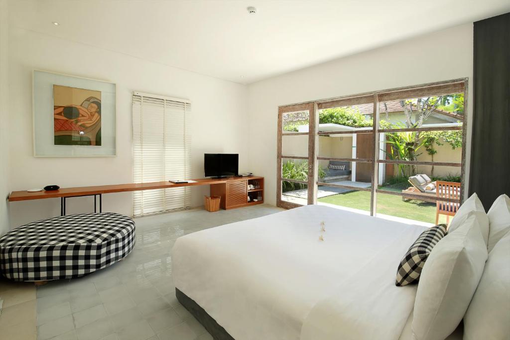 Spacious bedroom with garden access and modern design