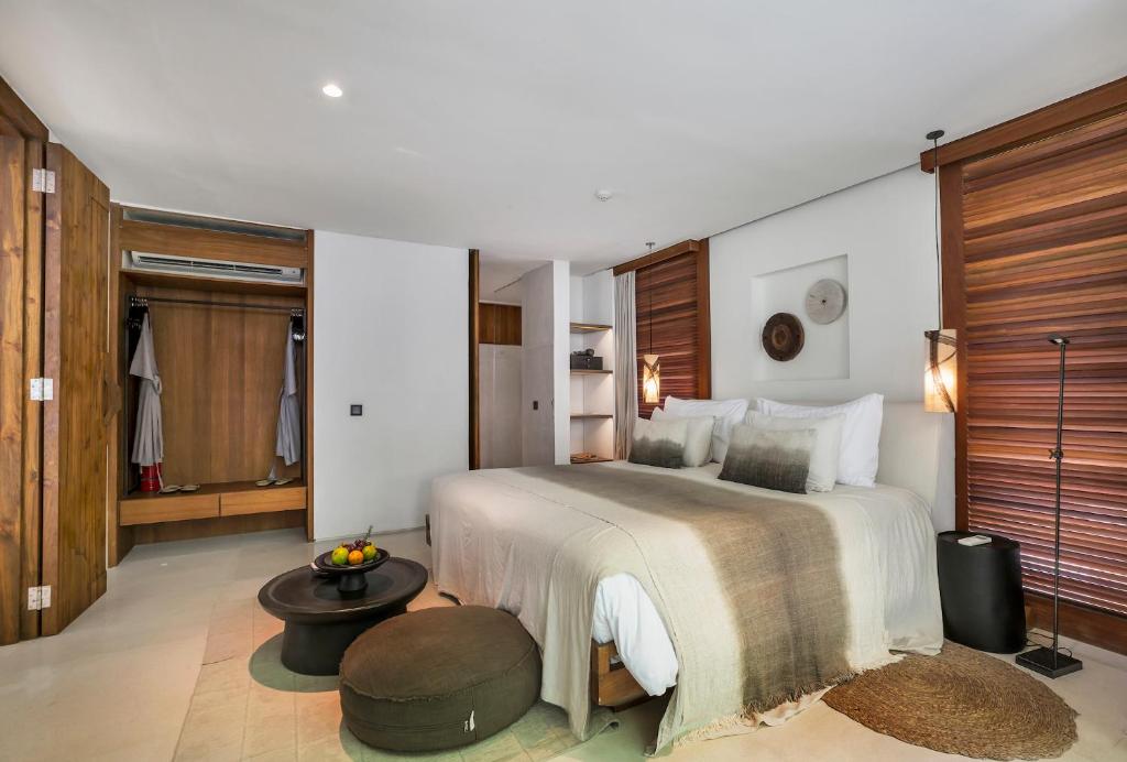 Neutral-toned bedroom with wooden accents