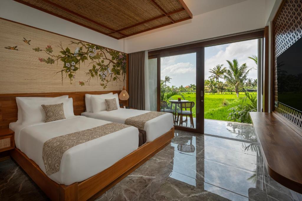 Twin beds overlooking rice fields