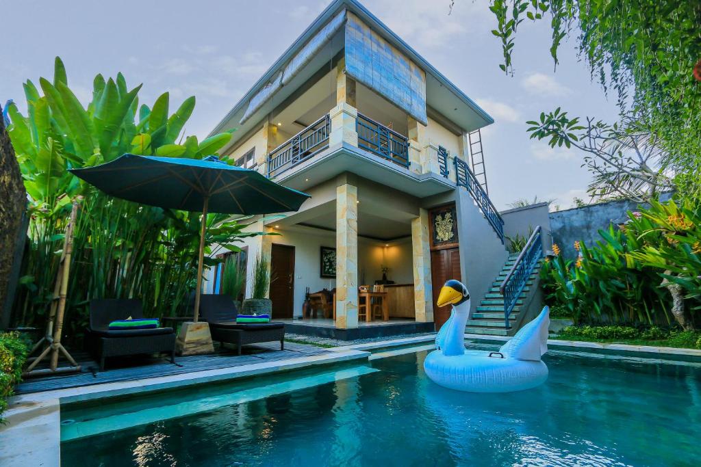 Two-story villa with a garden pool